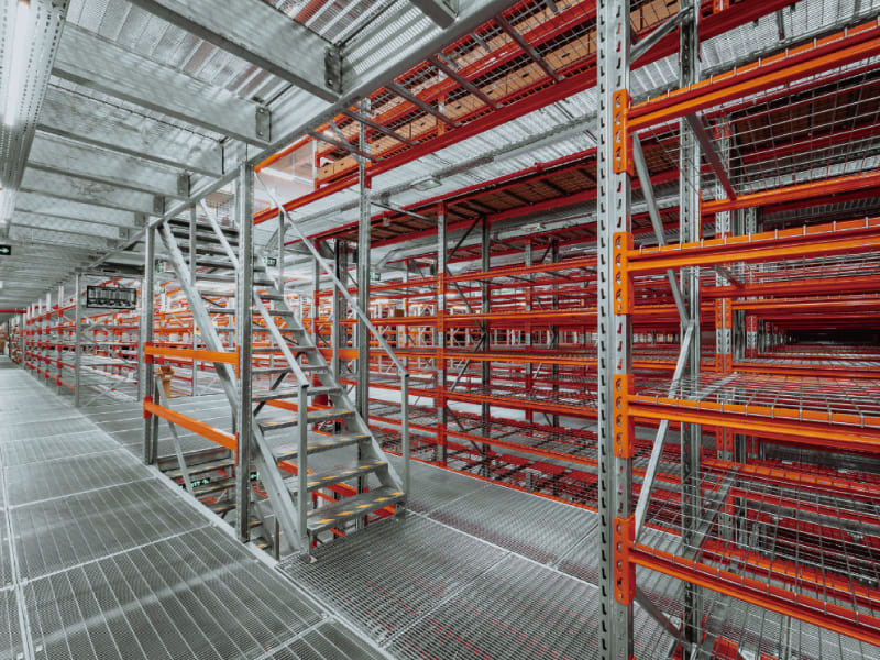 An image showing an industrial mezzanine floor racking system for reference